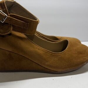Tan closed toe wedge pump with ankle strap